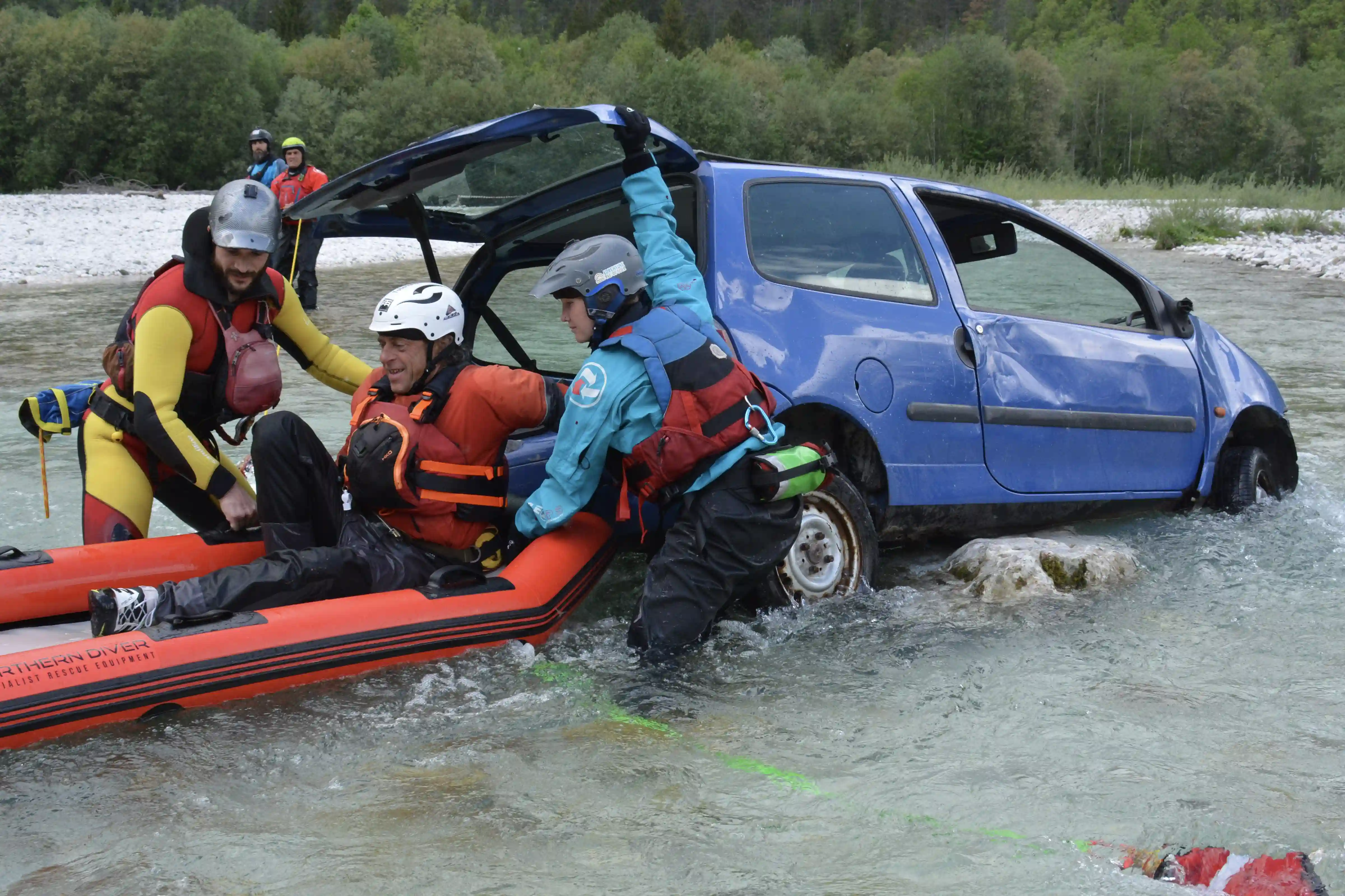 Rescue 3 Vehicles From Water Saving Person From Trunk Of A Car In a River With A Raft